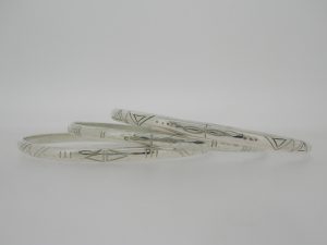 Assorted silver bangles